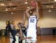 PCHS senior Kendrick Jackson scores two of his team leading 22 points during the fourth quarter of the Bulldogs� 61-55 victory over the Elba Tigers on Monday night. (Photo by Thomas Graning)