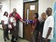 Mr. White cuts ribbon for grand opening of La Positive Shoppe 