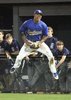 Clark jumping after catching the last out of the game.