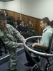 Cadet Captain Chris Crady in the pilot's chair