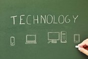 images of tech devices drawn on chalkboard