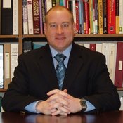 Dr. David A. Rust, Director